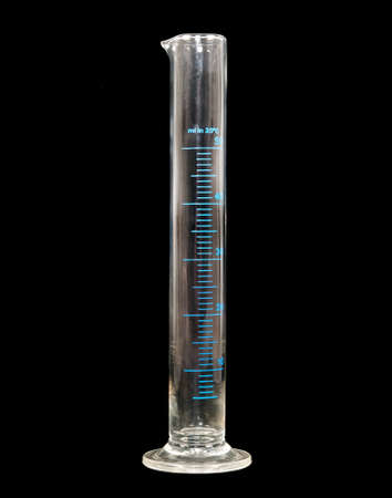 empty measuring cylinder made of glass on black backgroundの写真素材