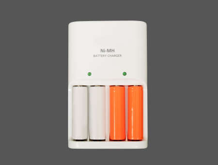 battery charger isolated on gray background - front viewの写真素材