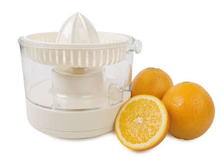 Juice squeezer with few oranges isolated on white の写真素材