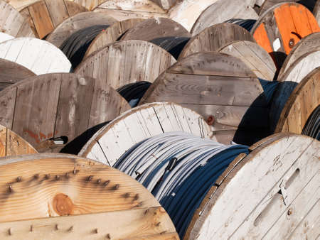 power line cables on wooden spoolsの写真素材