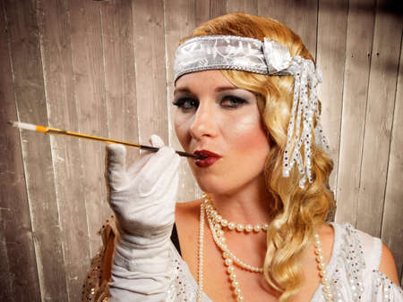 beautiful blond flapper girl smoking