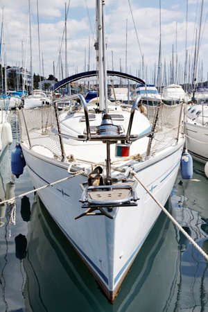 sailboat anchored in port, front viewの写真素材