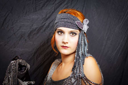 beautiful flapper girl from vintage twenties posing