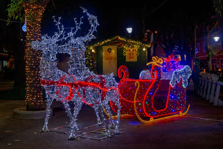 Santa Claus sleigh and two reindeer, Christmas decorationの写真素材