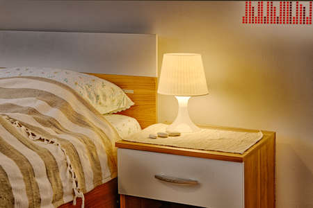 wallstickers, bedside table and lampの写真素材