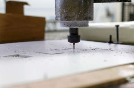 cnc machine and drill ready for cuttingの写真素材