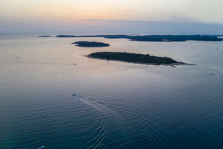 an aerial view of Brijuni islands, in foreground islands Kotez and Sv. Jerolim at dusk, Istria, Croatiaの写真素材