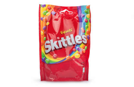 PULA, CROATIA - JANUARY 20, 2022: Closeup of Skittles candy made by Wm. Wrigley Jr. Company isolated on white backgroundのeditorial素材