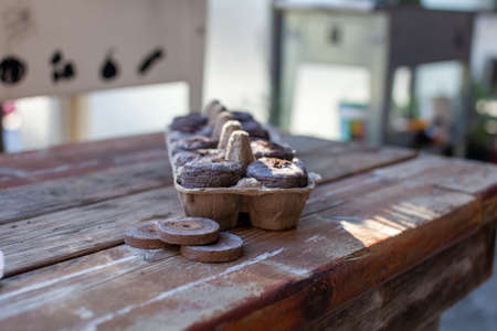Peat Pellets used for seed starters, favoured by gardeners, involves harvesting peat moss, which is unsustainable. Harvesting peat has led to irreversible damage. Coconut coir is a green alternativeの写真素材