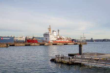 N Vancouver, BC, Canada - 03-12-2021: The Canadian Navy Icebreaker the Sir Wilfrid Laurier is moored at the Seaspan dry dock. It was made in Collingwood, Ontario in 1985のeditorial素材