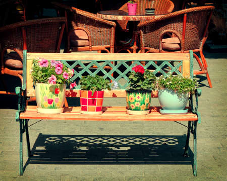 Retro bench  Flowers in pots の写真素材