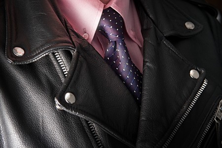 Businessman in leather jacket with pink shirt