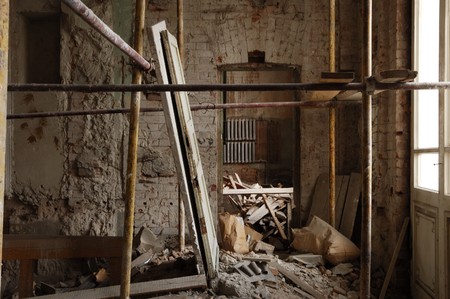 A redecorated building with bricks and wooden boardsの写真素材