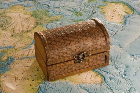 closed wooden chest on the map