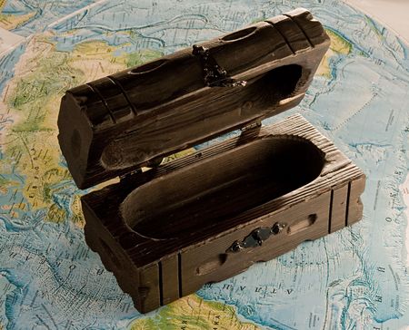 open  wooden chest on the map