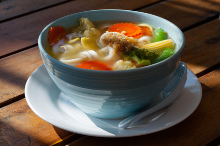Picture of asian vegetable noodle soup in a white plateの写真素材