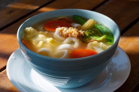 Picture of asian vegetable noodle soup in a white plateの写真素材