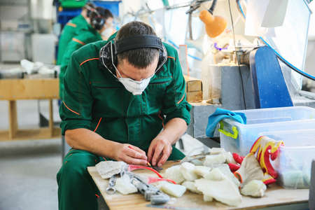 Processing of jade. industrial jewelry manufacturing. Sacred stone of Chinaの写真素材
