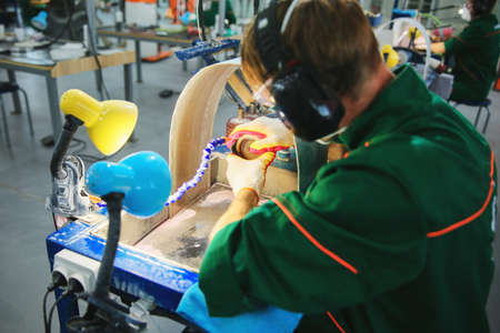 Processing of jade. industrial jewelry manufacturing. Sacred stone of Chinaの写真素材
