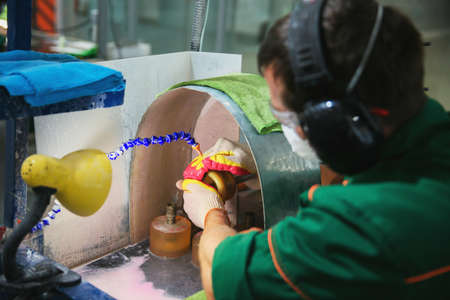 Processing of jade. industrial jewelry manufacturing. Sacred stone of Chinaの写真素材