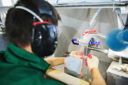 Processing of jade. industrial jewelry manufacturing. Sacred stone of Chinaの写真素材