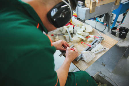 Processing of jade. industrial jewelry manufacturing. Sacred stone of Chinaの写真素材