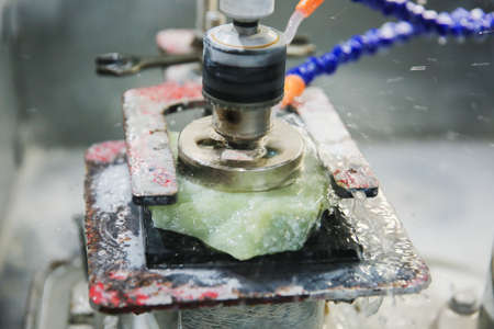 Processing of jade. industrial jewelry manufacturing. Sacred stone of Chinaの写真素材