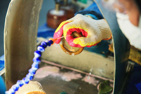 Processing of jade. industrial jewelry manufacturing. Sacred stone of Chinaの写真素材