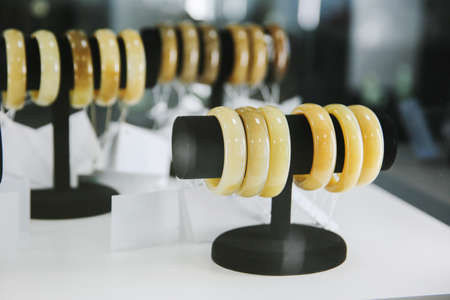 Jade bracelet in the jewelry store Precious stone jade. Sacred stone of Chinaの写真素材