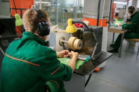Processing of jade. industrial jewelry manufacturing. Sacred stone of Chinaの写真素材