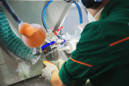 Processing of jade. industrial jewelry manufacturing. Sacred stone of Chinaの写真素材