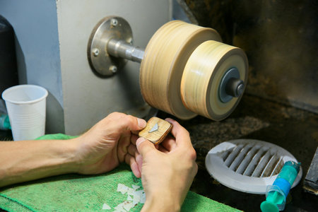Processing of jade. industrial jewelry manufacturing. Sacred stone of China