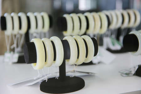 Jade bracelet in the jewelry store Precious stone jade. Sacred stone of Chinaの写真素材