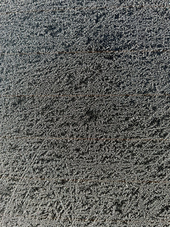 Grey abstract textured surface. Ideal for backgrounds, concepts, or overlays. Rough