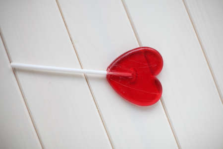 red candy on a white tableの写真素材