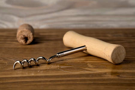 corkscrew with cork on wood background artの写真素材