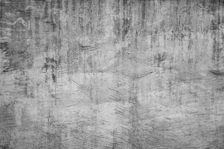 Abstract old scratched smoked metal texture with shaded edges, grunge background. Monochrome art.の写真素材