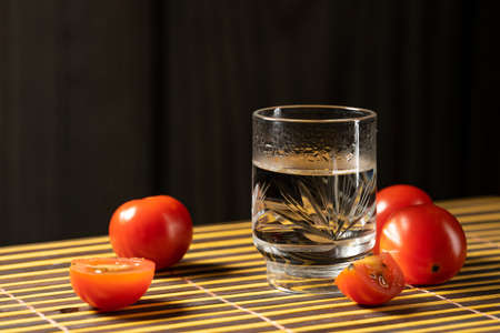 cherry tomatoes and vodka on the mat home styleの写真素材