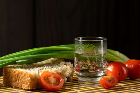 vodka vegetables still life on the mat home russian styleの写真素材