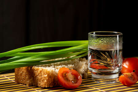 vodka vegetables still life on the mat home russian styleの写真素材