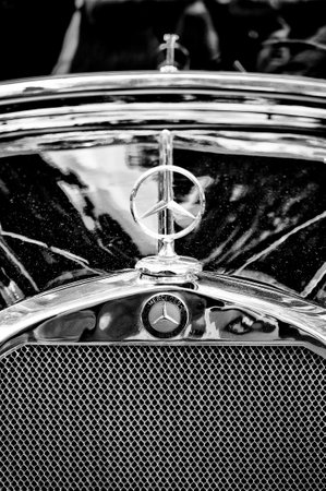 Mercedes-Benz symbol on the hood  Black and White , the exhibition  125 car history - 125 years of...