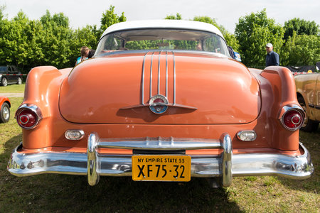PAAREN IM GLIEN, GERMANY - MAY 19  Car Pontiac Star Chief, 2-door coupe, First generation  1954 , rear view,  The oldtimer show  in MAFZ, May 19, 2013 in Paaren im Glien, Germanyのeditorial素材