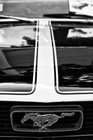 BERLIN - MAY 11  Detail of the hood and the emblem of a sports car Ford Mustang  Black and White  26  Oldtimer-Tage Berlin-Brandenburg, May 11, 2013 Berlin, Germanyのeditorial素材