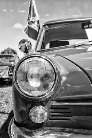 PAAREN IM GLIEN, GERMANY - MAY 19: Headlamp sports coupe NSU Sport-Prinz, black and white, The oldtimer show in MAFZ, May 19, 2013 in Paaren im Glien, Germanyのeditorial素材