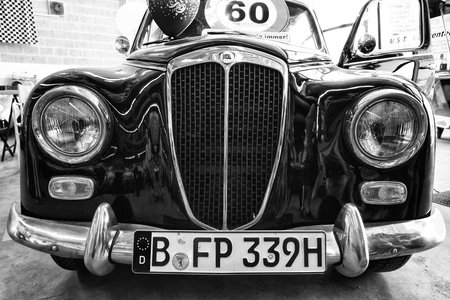 PAAREN IM GLIEN, GERMANY - MAY 19: Small family car Lancia Appia Berlina 1st series (1953), black and white, "The oldtimer show" in MAFZ, May 19, 2013 in Paaren im Glien, Germanyのeditorial素材