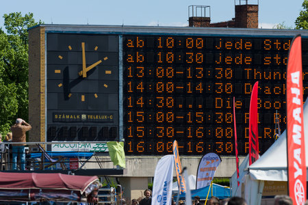 BERLIN, GERMANY - MAY 03, 2014: Electronic scoreboard with a schedule of performances of the festival. 2nd Berlin water sports festival in Gruenau. のeditorial素材