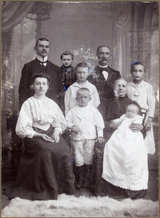 ROSTOCK, GERMANY - CIRCA 1907: Vintage portrait of a multi-generational family, circa 1907