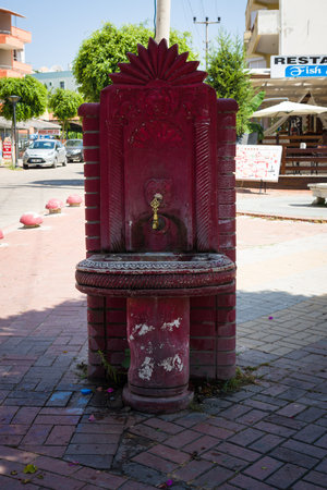 AVSALLAR, TURKEY - JUNE 30, 2014: The source of drinking water in the street. Avsallar - is a popular tourist destination on the Mediterranean.のeditorial素材