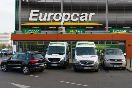 BERLIN - OCTOBER 31, 2014: Europcar is a car rental company owned by Eurazeo. Europcar today operates a fleet of over 200,000 vehicles at 2,825 locations in 143 different countriesのeditorial素材
