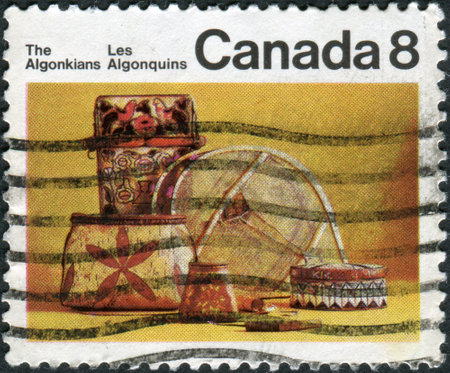CANADA - CIRCA 1973: Postage stamp printed in Canada, shows artifacts of the indigenous people of North America - Algonquian, circa 1973のeditorial素材